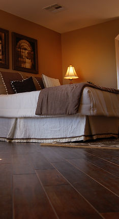 Hardwood flooring in warm bedroom setting